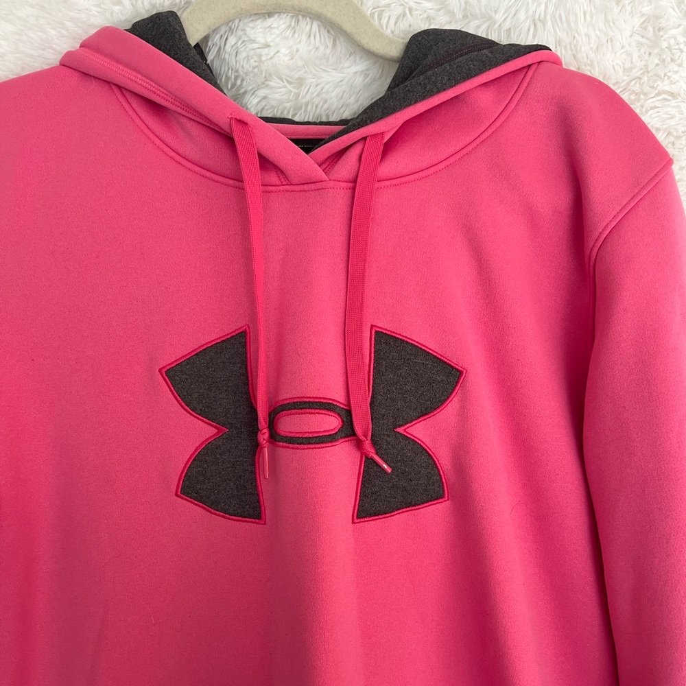 Bright pink under Armour hooded sweatshirt size Large never worn